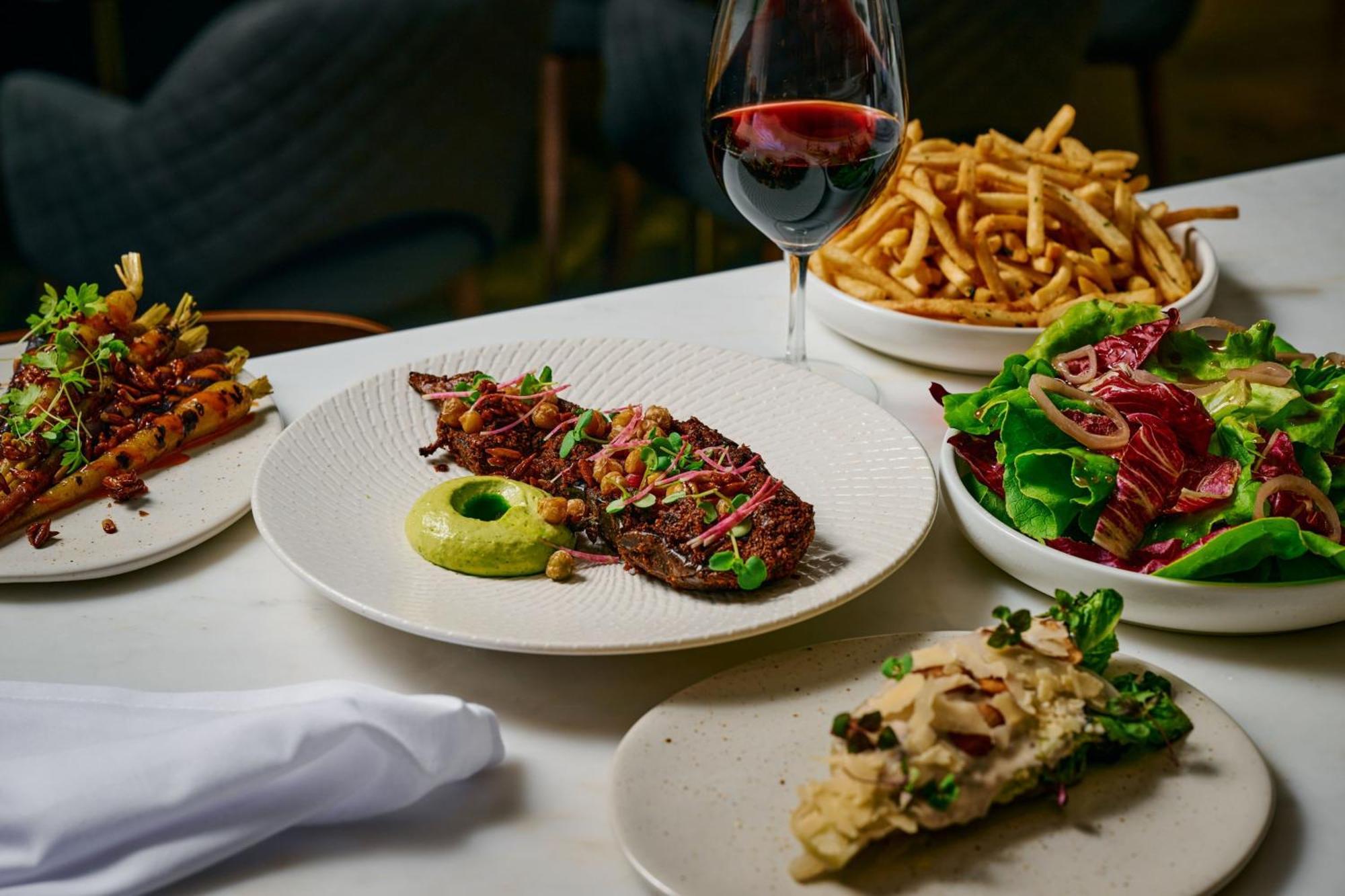 Sheraton Melbourne Hotel Bagian luar foto A selection of dishes at the restaurant